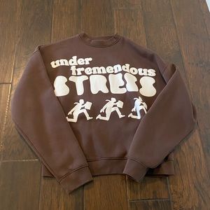 Sisters and Seekers “under tremendous stress” crewneck